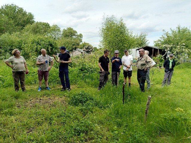  A group on a visit to the Down to Earth Allotment