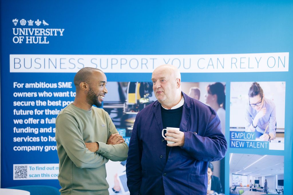 Anton James of the Flood Innovation Centre talks to a small business person 